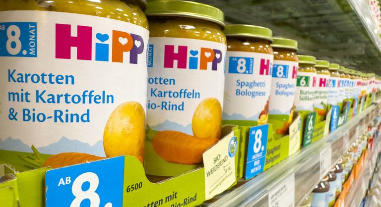 Bébiételbe rejtett patkányméreg – zsarolók célkeresztjében a HiPP