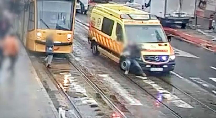Videó: szirénázó mentő elé szaladt egy gyalogos a Nagykörúton, hajszálon múlt a súlyosabb baleset
