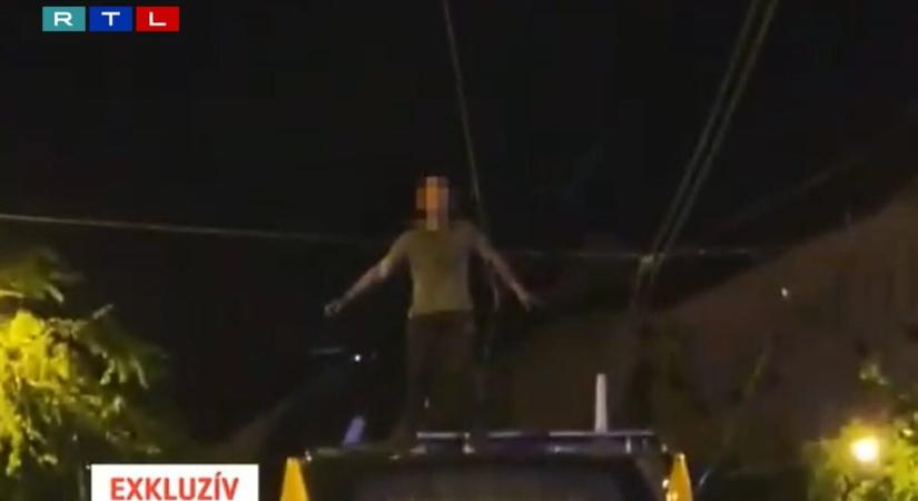 Videón a táncoló férfi, akit órákig tartott leszedni a 4-es 6-os villamos tetejéről