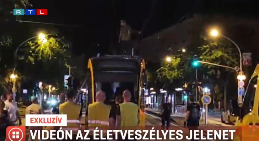 Videó: órákig táncolt egy férfi a Combino tetején, rendőrök szedték le a villamosról