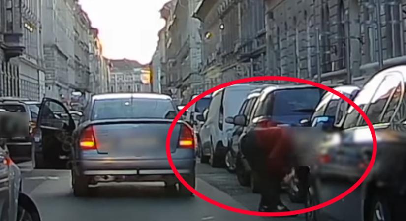 Meghúzta a BMW-t, összeszedte a saját tükrének darabjait, majd elhajtott egy autós Budapesten - videó