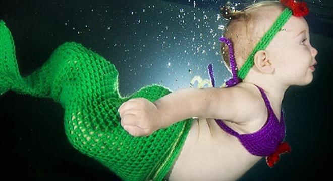 Kisbabák víz alatti képeivel merüljetek el a cukiság tengerében!