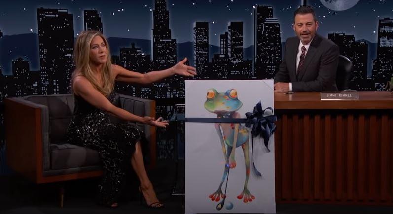 Örülnél, ha Jennifer Anistontól kapnál egy festményt, amin egy béka golfozik?