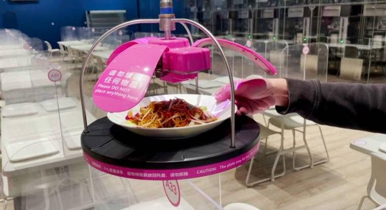 Robotok készítik az ételt a pekingi olimpiai faluban