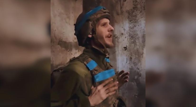 Videón, ahogy robbanások zaja közepette énekli egy ukrán katona az Eurovízió-győztes dalt