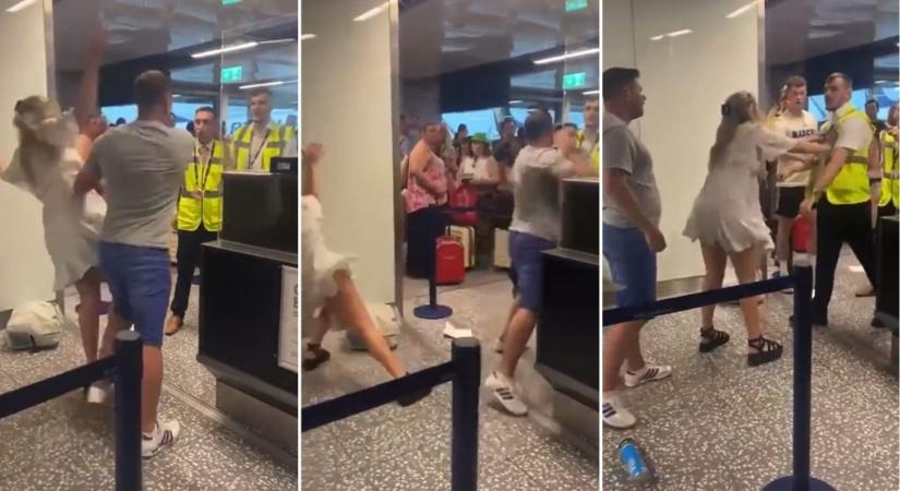 Videón, ahogy a reptéri ellenőrzés közben arrébb löki a barátnőjét, és nekimegy a biztonságiaknak