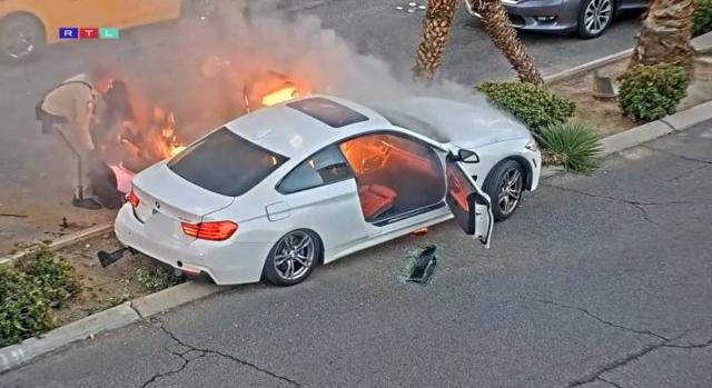 Videón az elképesztő életmentés: másodpercekkel azelőtt húzták ki a kocsijából, hogy felrobbant volna