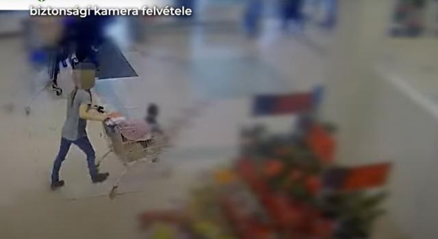 Videón, ahogy kitolja a megpakolt bevásárlókocsit a Tescóból a kislányával lopó anyuka