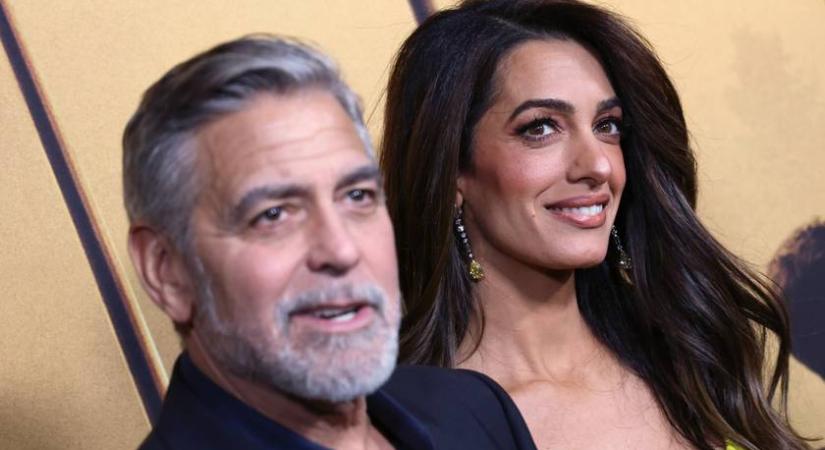 Amal Clooney virágos nyári ruhája telitalálat: George Clooney-val kézen fogva fotózták