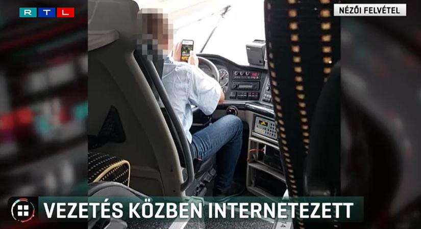 Szakadó esőben mobilozott vezetés közben a Volánbusz sofőrje – videó