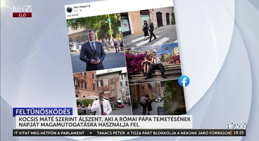 A felvett fekete öltönyt is divatfotózásra, magamutogatásra használja fel, az egy hamis, álszent, önimádó bohóc  videó