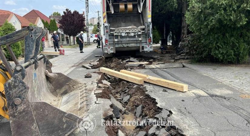 Lesd meg, hogyan szakadt be az út a több tonnás kukásautó alatt - helyszíni fotók - Feol