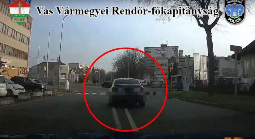 Rendőrök elől menekült a BMW-s ámokfutó, átment a piros lámpán, a záróvonalon - videó