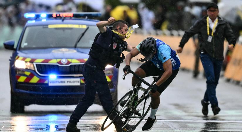 Egy amatőr megpróbált begurulni a Tour de France céljába, de leteperték, mielőtt elérte volna azt