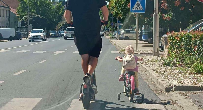 Rolleres magyar apukáról és kislányáról raktak ki fotót a netre, azonnal felháborodott mindenki