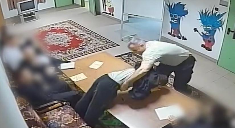 A Kutyapárt a Nyugati téren vetíti le újra és újra, ahogy a Szőlő utca egyik nevelője bántalmazza az egyik gyereket