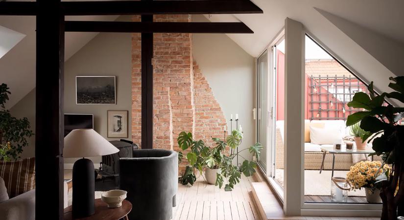 Téglafalak, fény és skandináv báj: lenyűgöző kétszintes tetőtéri lakás Göteborg szívében