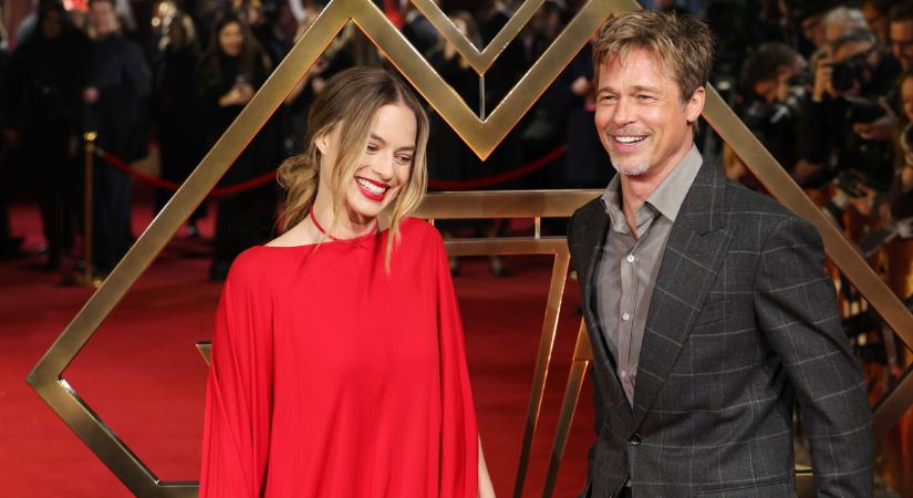 Hoppá: Nem volt benne a forgatókönyvben, de Margot Robbie mégis megcsókolta Brad Pitt-tet